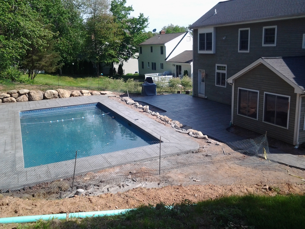 Swimming pool project showing hardscape and water balance